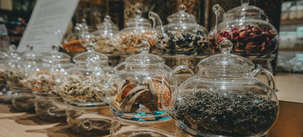 Close-up of glass jar for sale at market stall