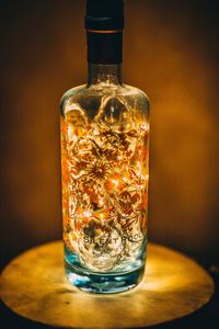 Close-up of beer bottle on table