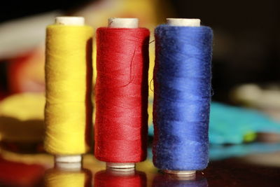 Thread spools on table