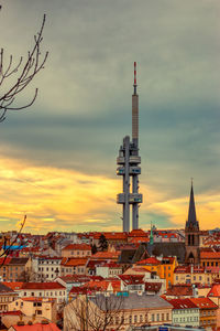 Tv tower in prague in warm summer morning with yellow sky vertical