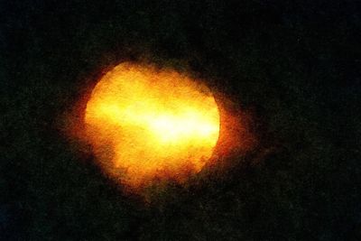 Close-up of illuminated light at night