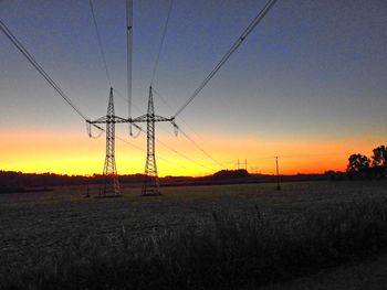 Electricity pylons on landscape