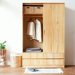 Clothes hanging in basket at home