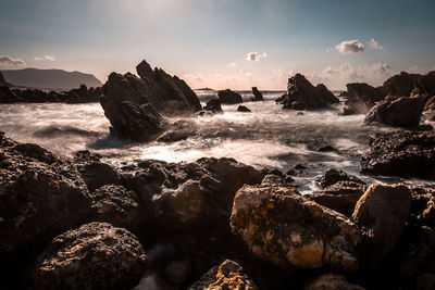 Scenic view of sea against sky during sunset