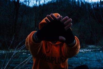 Man standing in forest