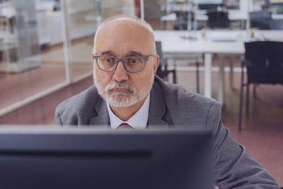 Portrait of man using mobile phone