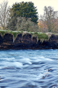 Scenic view of river against sky