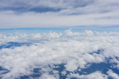 Aerial view of cloudscape over sea against sky