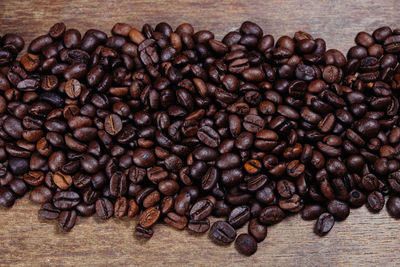 Close-up of coffee beans on table