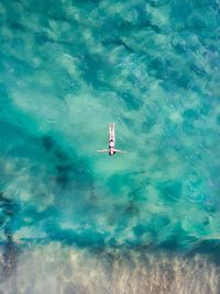 High angle view of person swimming in pool