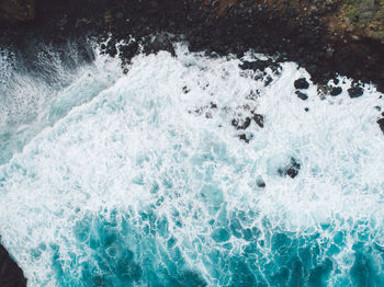 Close-up of water splashing in swimming pool