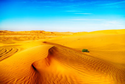 Scenic view of desert against sky