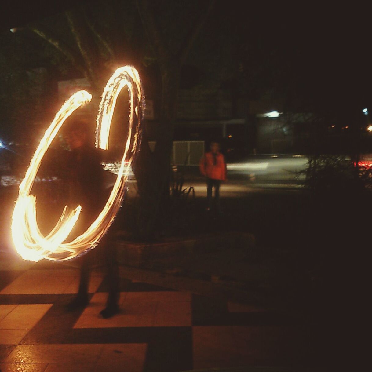 illuminated, night, transportation, lifestyles, men, mode of transport, leisure activity, motion, land vehicle, blurred motion, on the move, speed, person, street, rear view, full length, walking, unrecognizable person