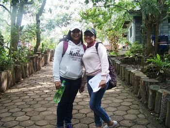 Full length of couple standing outdoors