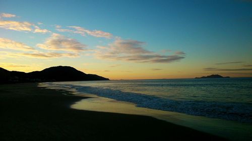 Scenic view of sea at sunset
