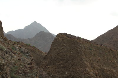 Scenic view of mountains against clear sky