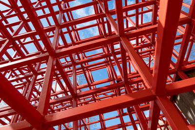 Low angle view of metallic structure against sky