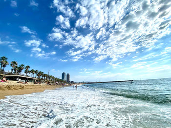 Scenic view of beach against sky