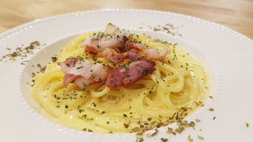 Close-up of pasta in plate on table