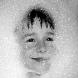 Close-up portrait of woman in water