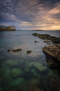 Scenic view of sea against sky during sunset