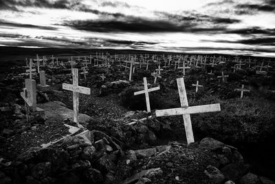 Close-up of cross on cemetery