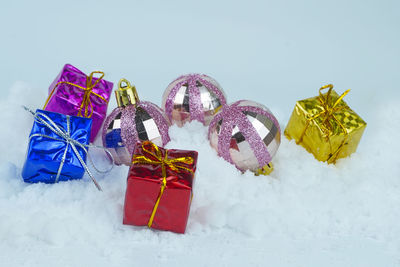 High angle view of christmas decorations on snow