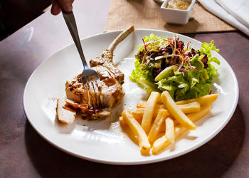 Close-up of food in plate on table