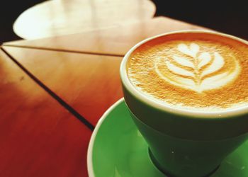 High angle view of cappuccino on table