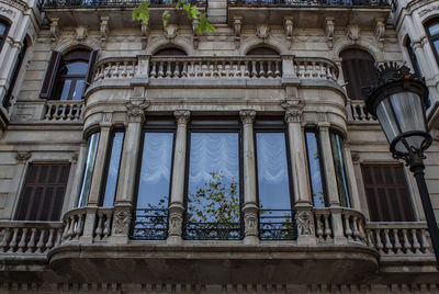 Facade of a historical house characterized by elegance and discreet exclusivity in barcelona, spain.