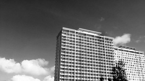 Low angle view of modern building against sky