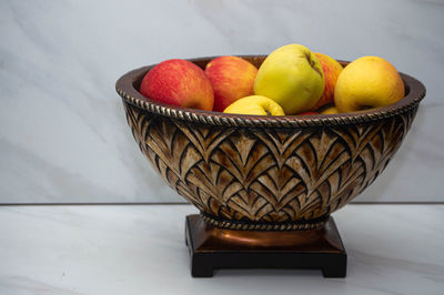 Close-up of fruits in bowl on table