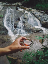 Hot tea at the waterfall in the big forest