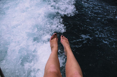 Legs over the water. vacation 