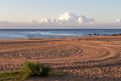 Scenic view of beach against sky