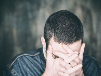 Close-up of tensed man outdoors