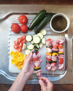 High angle view of person preparing food