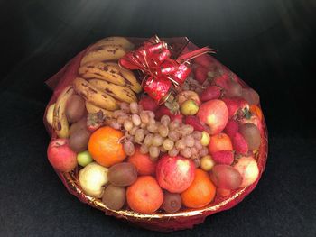 High angle view of grapes in basket