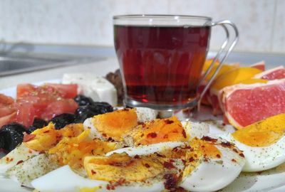 Close-up of herbal tea and snacks