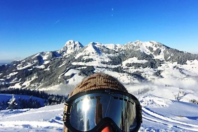 Scenic view of snow covered mountains