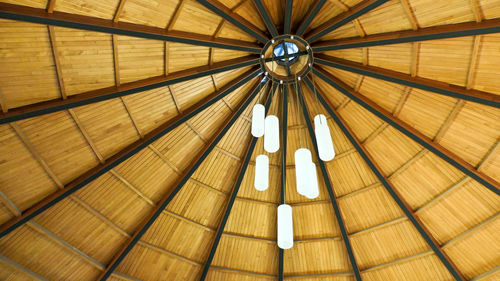 Closeup shot of an elegant and beautiful chandelier hanging on ceiling