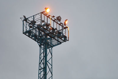 Low angle view of illuminated light against sky