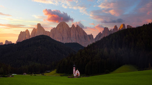 Panoramic view of mountains against sky during sunset