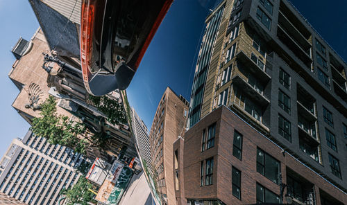 Low angle view of buildings against clear sky