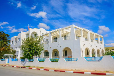 White building against blue sky