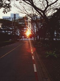 Empty road at sunset