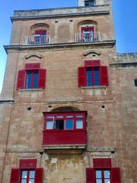 Low angle view of red building