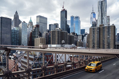 View of the new york skyline from the brooklyn bridge