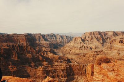 Rock formations on mountain against sky