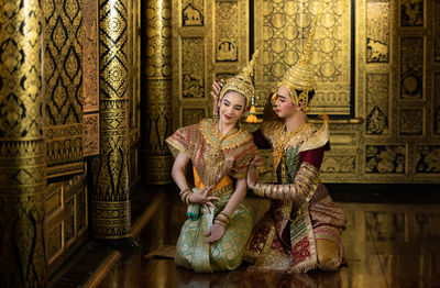 Khon, is a classical thai dance in mask. except for these two characters who weren't wearing masks.